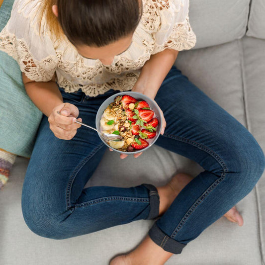 woman eating healthy breakfast