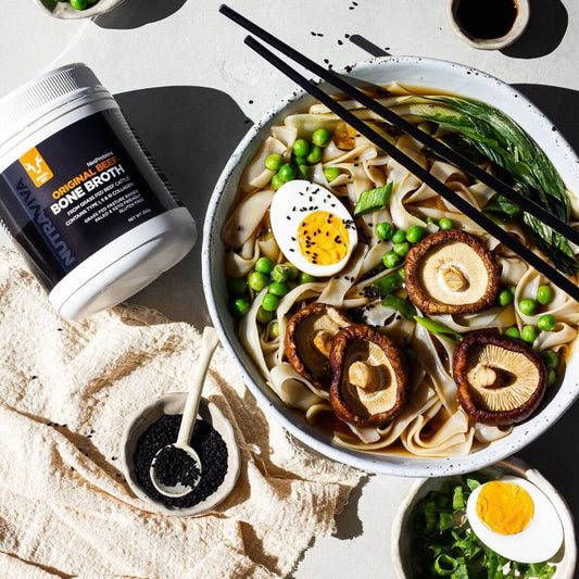 beef bone broth with egg and vegetables ramen noodles,