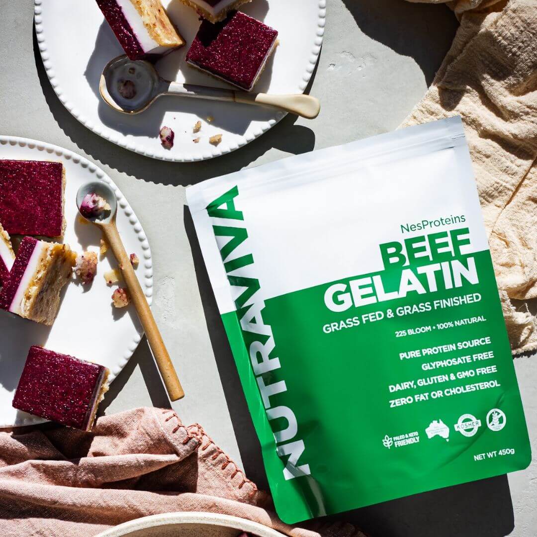pack of Nutraviva beef gelatin powder on bench with berry and vanilla slice
