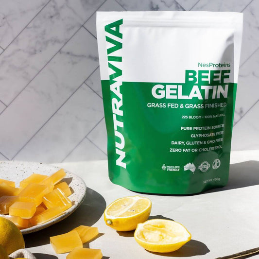 pack of beef gelatin with bowl of gut health gummies and lemon