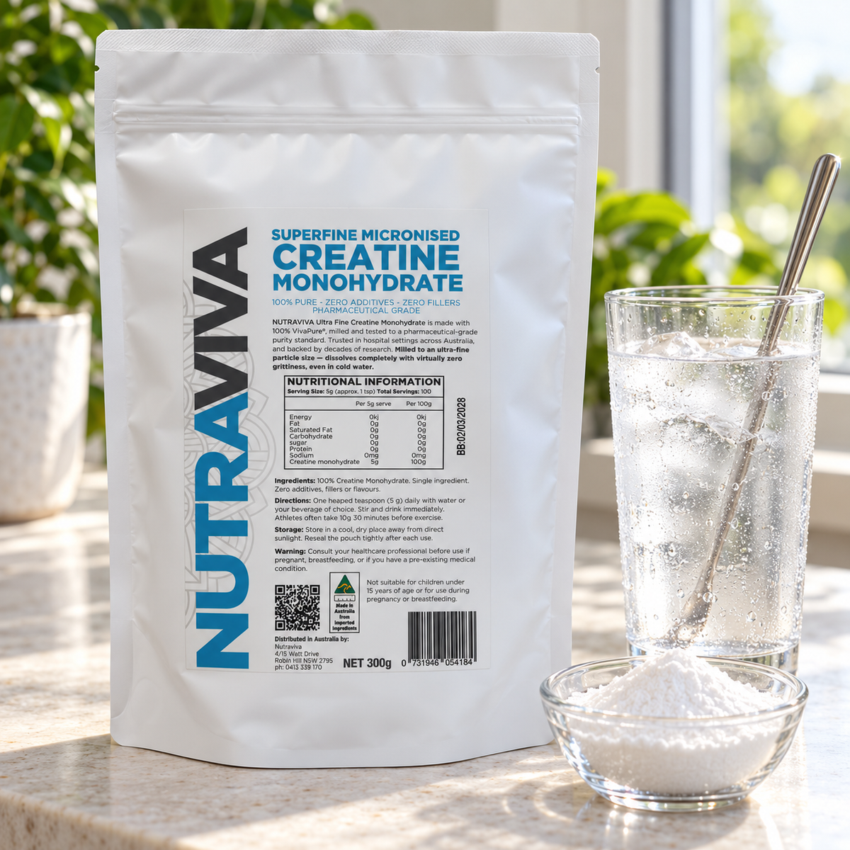 Nutraviva Limited Edition Superfine Micronised Creatine Monohydrate 300g pouch beside a glass of iced water